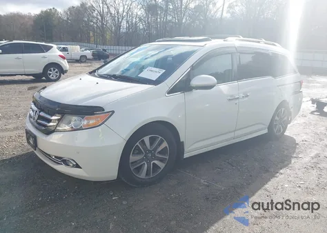 2016 Honda Odyssey Touring/Touring Elite z USA, uszkodzony, nr VIN 5FNRL5H9XGB014319
